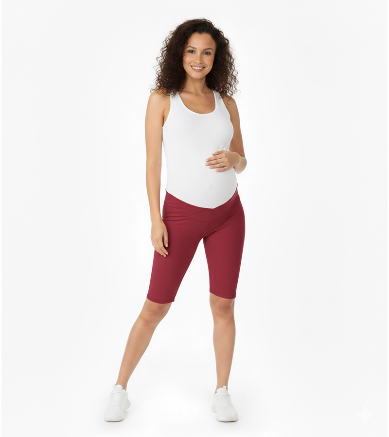 Krótkie legginsy damskie - ciążowe przed kolano ze skośnym pasem pod brzuch w kolorze bordo Bensini®