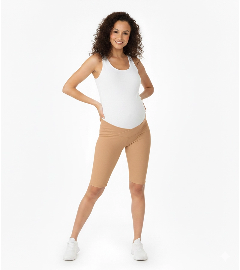 Krótkie legginsy damskie - ciążowe przed kolano ze skośnym pasem pod brzuch w kolorze camel Bensini®